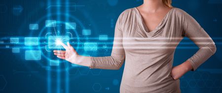 Young woman pressing high tech type of modern buttons 