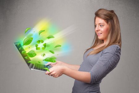 Casual young woman holding notebook with recycle and environmental symbols