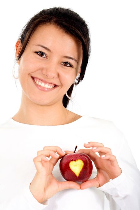 I love my diet - girl holding a red apple with a heart shape on it isolated over a white background