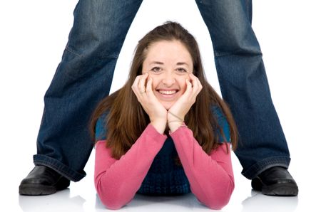 happy girl portrait smiling with man legs behind her - isolated over a white background
