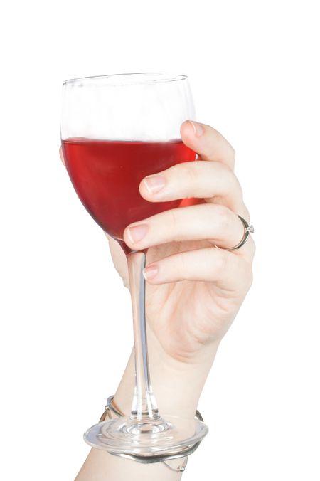Hand with red wine glass over a white background
