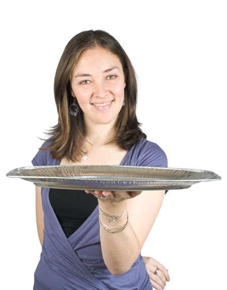 Casual smiling woman holding a tray over a white background