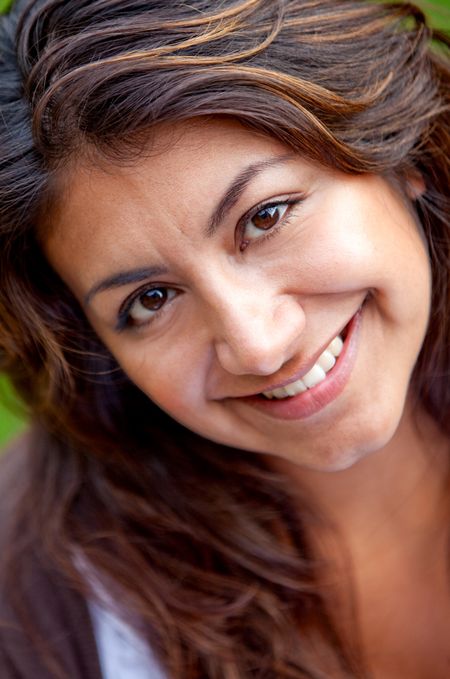 Portrait of a beautiful happy woman smiling