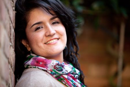 beautiful-woman-portrait-outdoors-leaning-brick-60851734 Beautiful woman portrait outdoors leaning against a brick wall