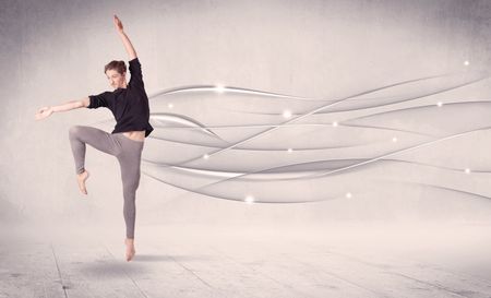 Ballet dancer performing modern dance with abstract lines concept on background