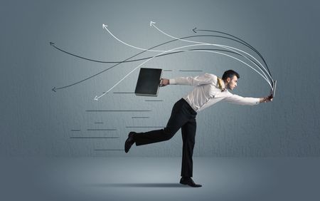 Running businessman with device and hand drawn lines concept on background