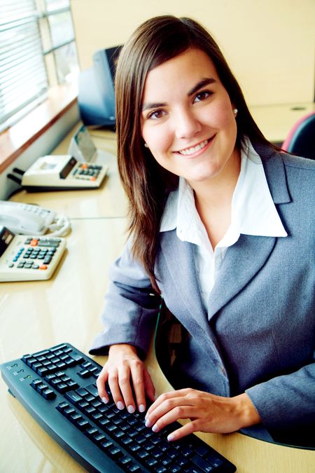Business accountant portrait smiling in an office - hispanic