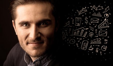 A successful confident businessman near graph pie charts and calculations concept