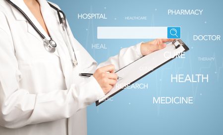 Female doctor holding notepad with blue background and search bar with hovering medical words