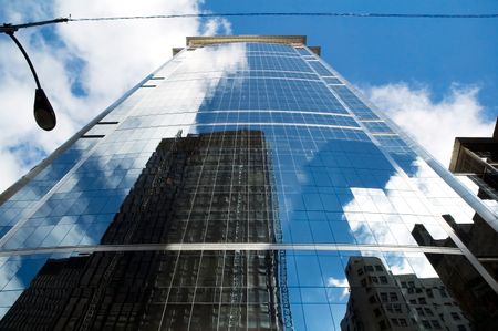 Skyscrapers reflected by skyscraper