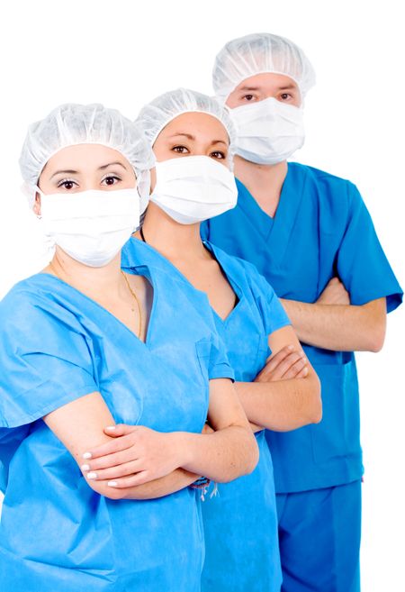 medical team formed of three nurses or doctors - isolated over a white background