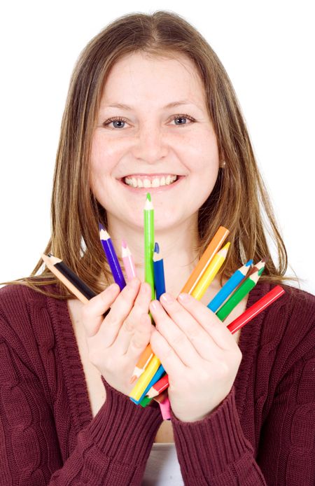 girl holding colour pencils isolated over a white background
