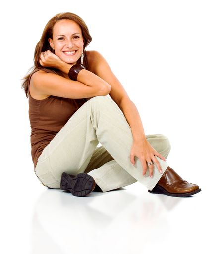 Casual woman portrait on the floor over a white background