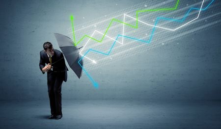 Business person with umbrella and colorful stock market arrows concept