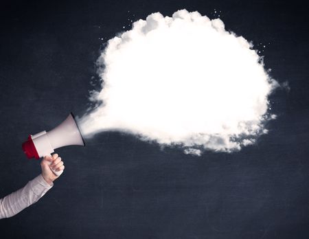 Caucasian business hand holding megaphone with white plain message cloud