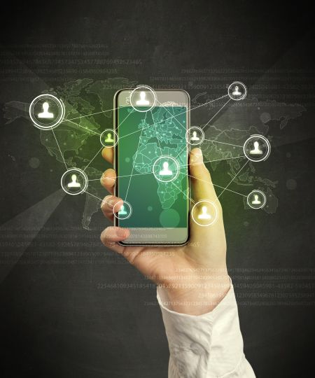 Caucasian hand in business suit holding a smartphone, social network concept