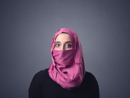 Young muslim woman wearing niqab