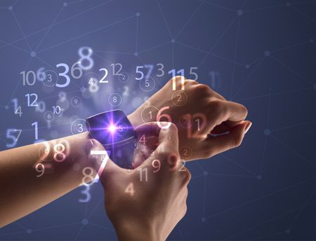 close-female-naked-hand-wearing-smartwatch-618003398 Close up female naked hand wearing smartwatch and numbers around