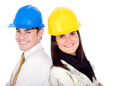 couple of young architects portrait smiling and isolated over a white background