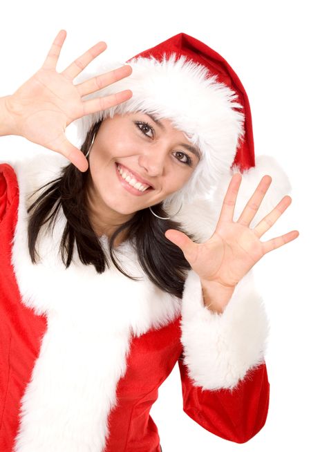 christmas female santa appearing in the frame looking happy with her hands next to her face - isolated over a white background