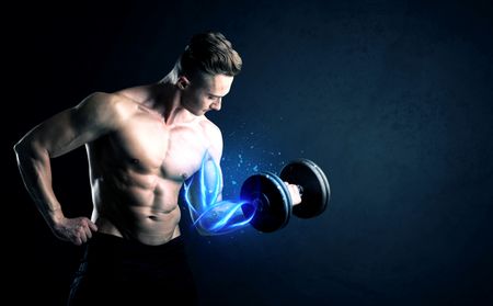 Fit athlete lifting weight with blue muscle light concept on background