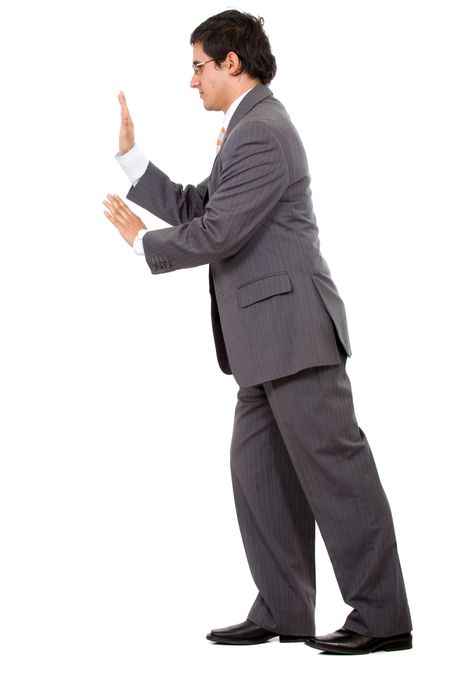 business man pushing something aside isolated over a white background
