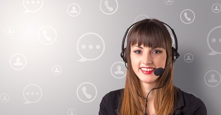 Young female telemarketer with white speech bubbles around her