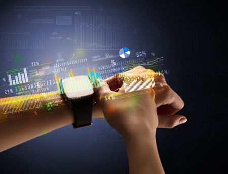 cloe-naked-female-hand-smartwatch-financial-626456348 Cloe up naked female hand with smartwatch with financial symbols around