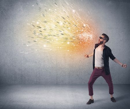young-hipster-guy-beard-sunglasses-shouting-628042868 A young hipster guy with beard and sunglasses shouting in front of urban wall with vomit like colorful paint splatter on wall concept