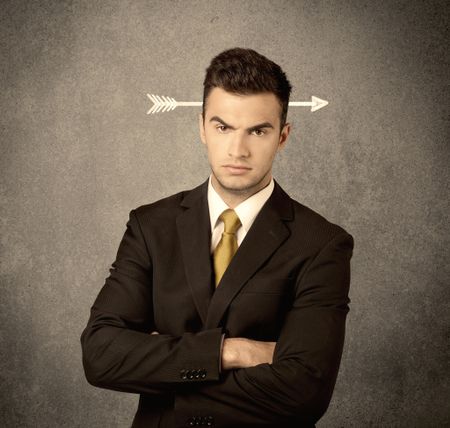 confused-young-business-guy-giving-thumbs-630797141 A confused young business guy giving thumbs up with a drawn arrow going through his head concept
