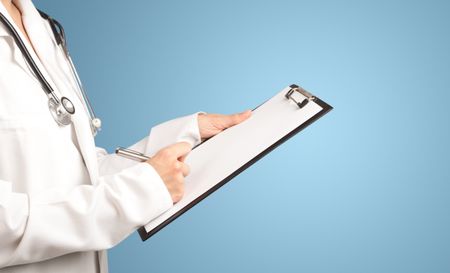 Female doctor holding notepad with blue background 