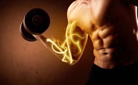Muscular body builder lifting weight with energy lights on biceps concept