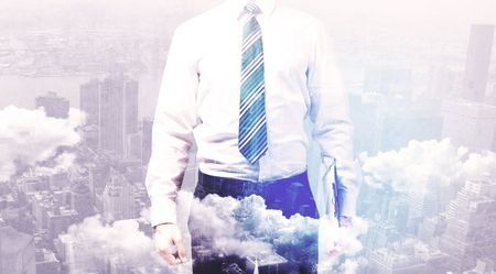 Business man standing at city overlay view background 