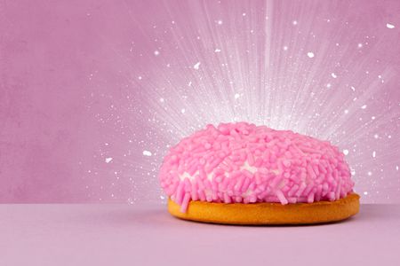 Sparkling tasteful home made sugar cake with coloful background