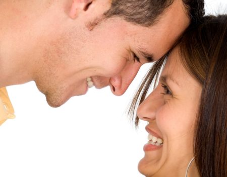 Beautiful couple smiling while facing at each other