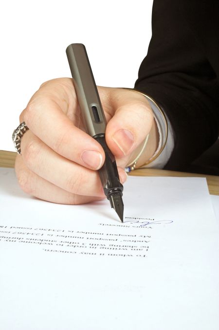 business person signing a letter