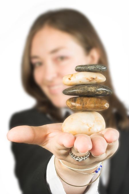 business woman holding stones on her hand