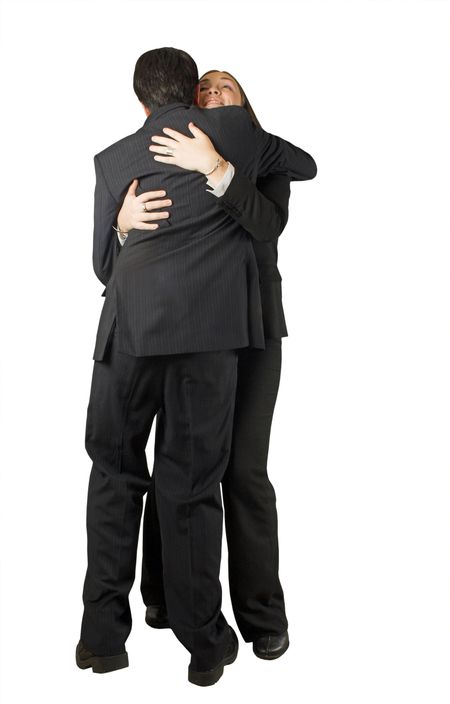 business couple hugging and celebrating