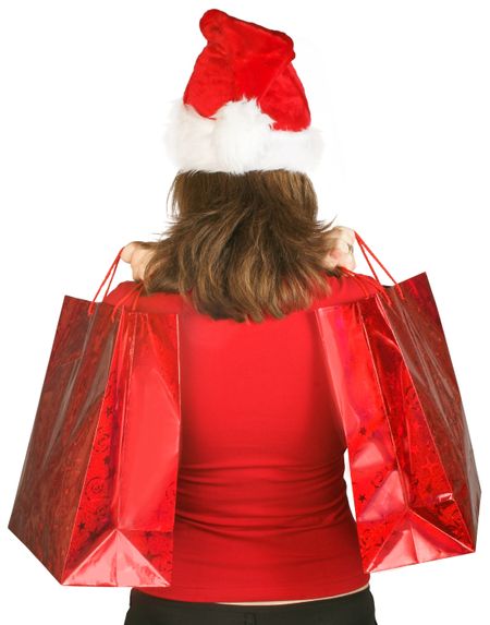 christmas shopping bags held by santa