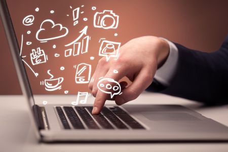 An elegant businessman sitting at desk and pushing the buttons of his laptop keyboard while working on everyday office tasksillustration concept