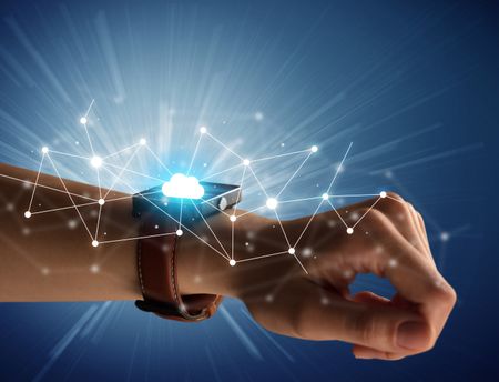 Close up female hand with smartwatch and with cloudy and connection icons around