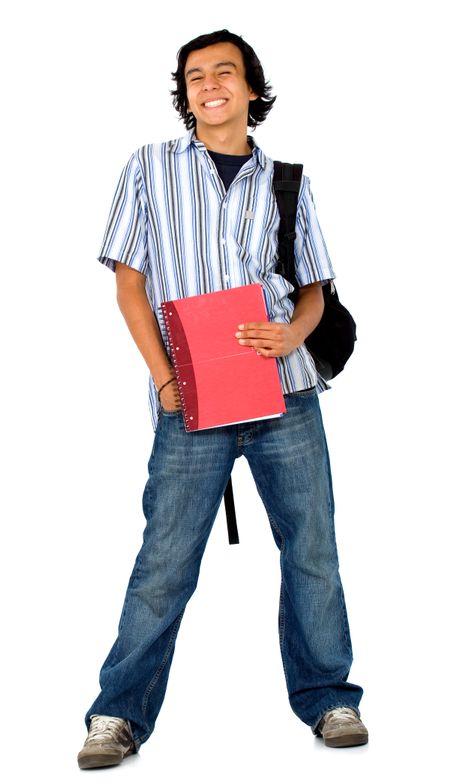 casual student with a notebook smiling at the camera - isolated over a white background and the guy is standing up