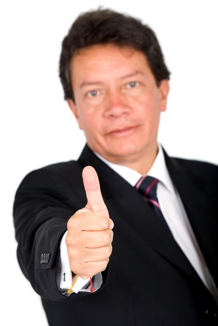 senior business man smiling with thumbs up isolated over a white background