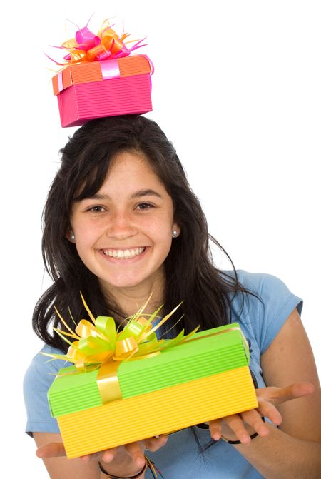 casual girl full of gifts looking happy with a big smile on her face isolated over a white background