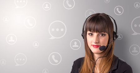 Young female telemarketer with white speech bubbles around her