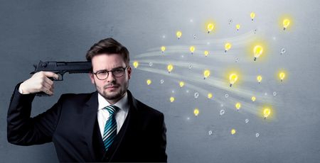 Man shoots his head with gun and idea bulbs are coming out from his head