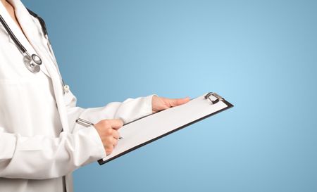 Female doctor holding notepad with blue background 