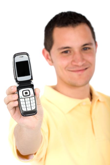 casual man showing a mobile phone over a white background