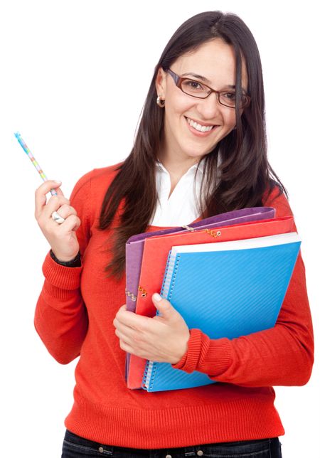 Female student smiling with notebooks - isolated over a white background