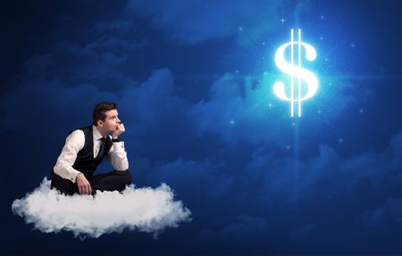 Caucasian businessman sitting on a white fluffy cloud wondering about huge money sign